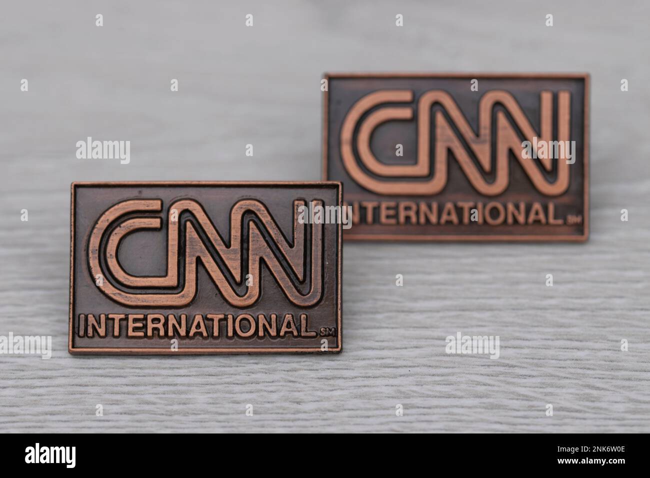 Close Up CNN International Pins At Amsterdam The Netherlands 2222023