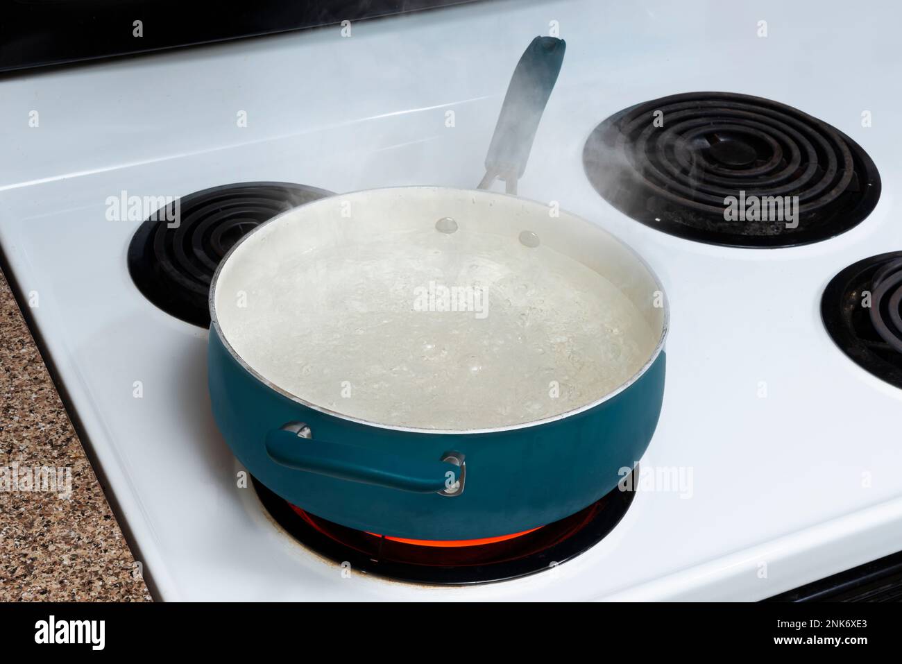 Boiling Pot Of Water On Hot Electric Burner Stock Photo, Picture and  Royalty Free Image. Image 34317573.