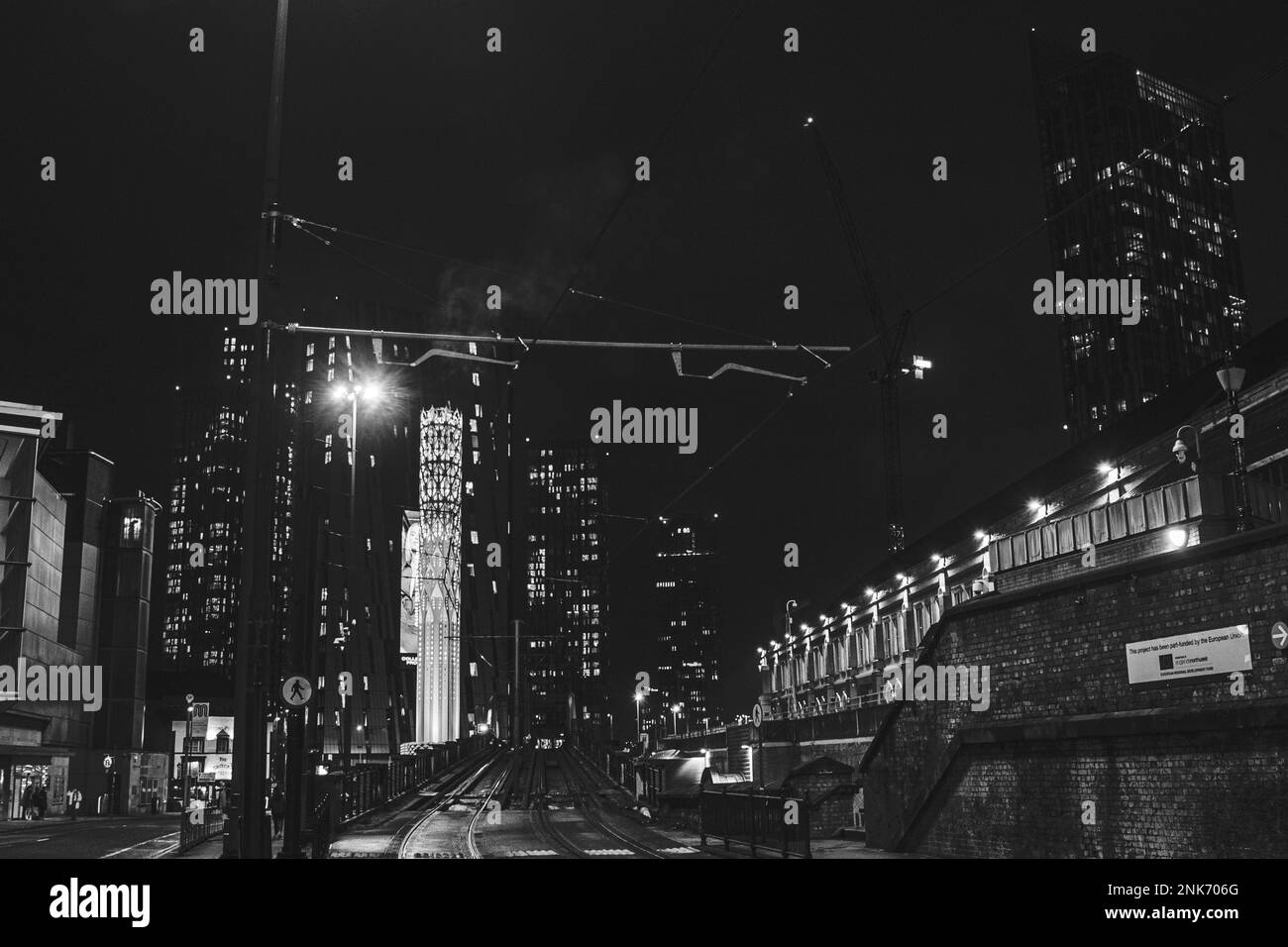Manchester, England - February 02.2022, city on the night, black and white. Stock Photo