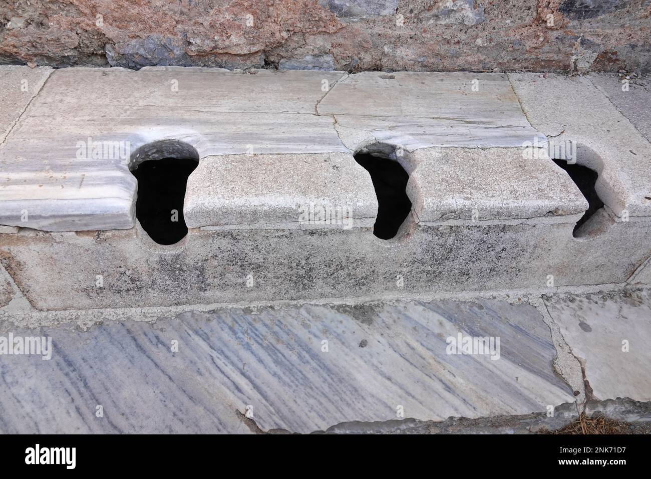 The Public Toilets or ancient latrines of Ephesus in Turkey Stock Photo