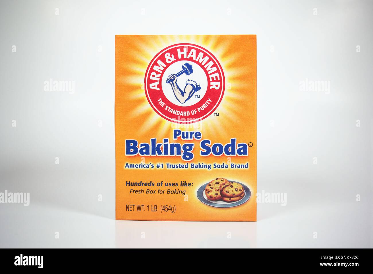 New York, NY October 5, 2021 Arm Hammer brand baking soda in orange box isolated on a white