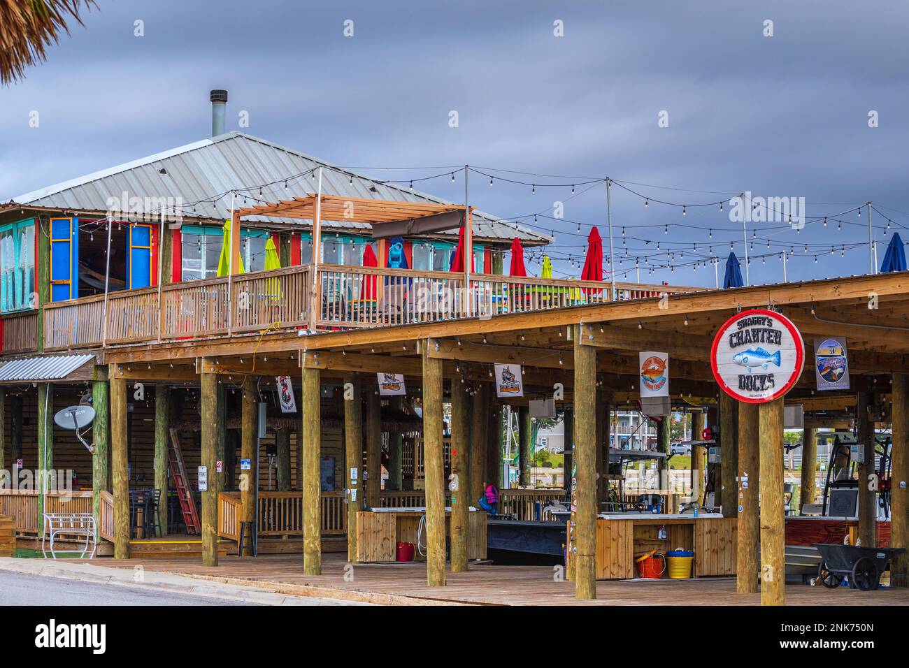 Shaggy's Restaurant and fishing charter boat dock in Pass Christian Harbor, Mississippi, USA. Stock Photo