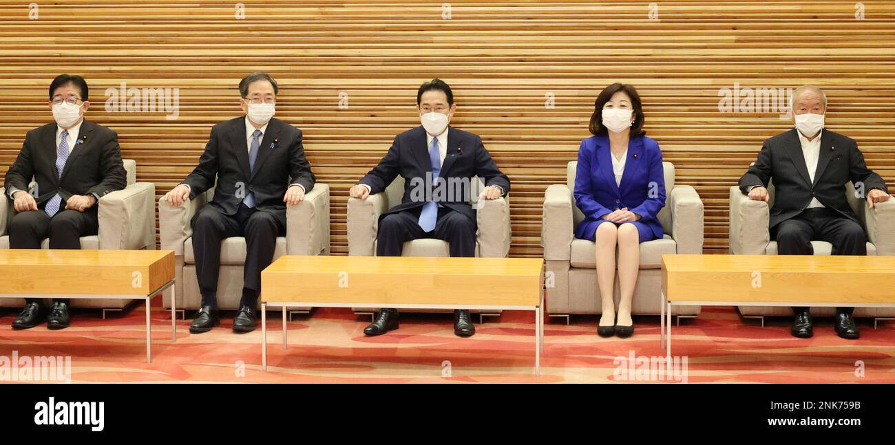 Japan's Prime Minister Fumio Kishida (C) attends a cabinet meeting at ...