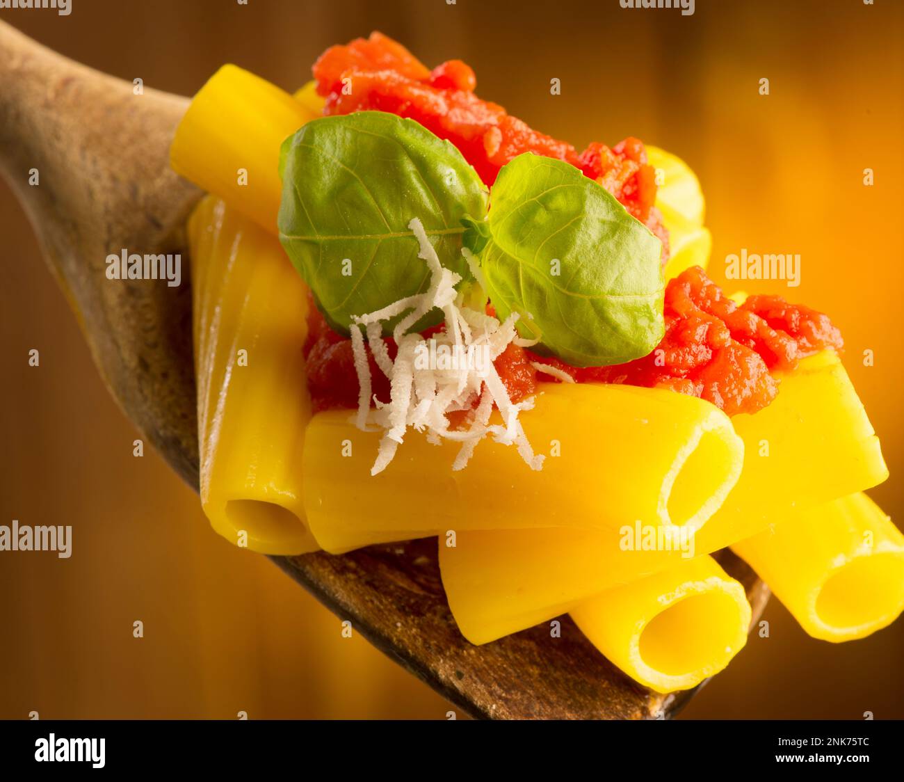 ladle with macaroni and tomato sauce Stock Photo Alamy