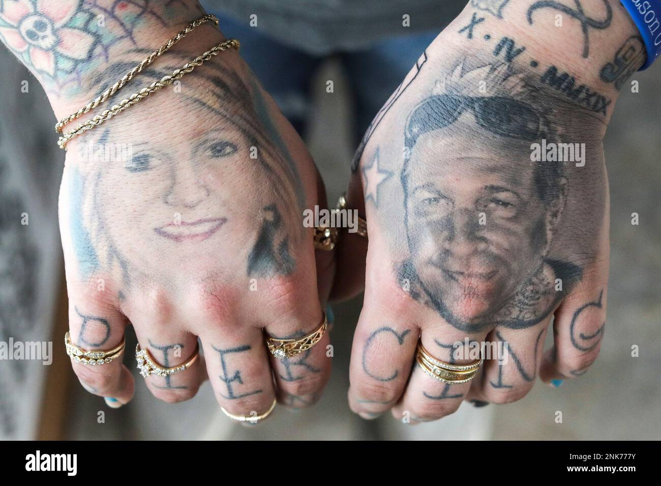 Megan O'Connor shows off her tattoo portraits of her mother Tammy and  father Johnny on Thursday, May 5, 2022, at Wildside Tattoo and Body  Piercing in Cedar Rapids, Iowa. Megan works together, image size:1300x956