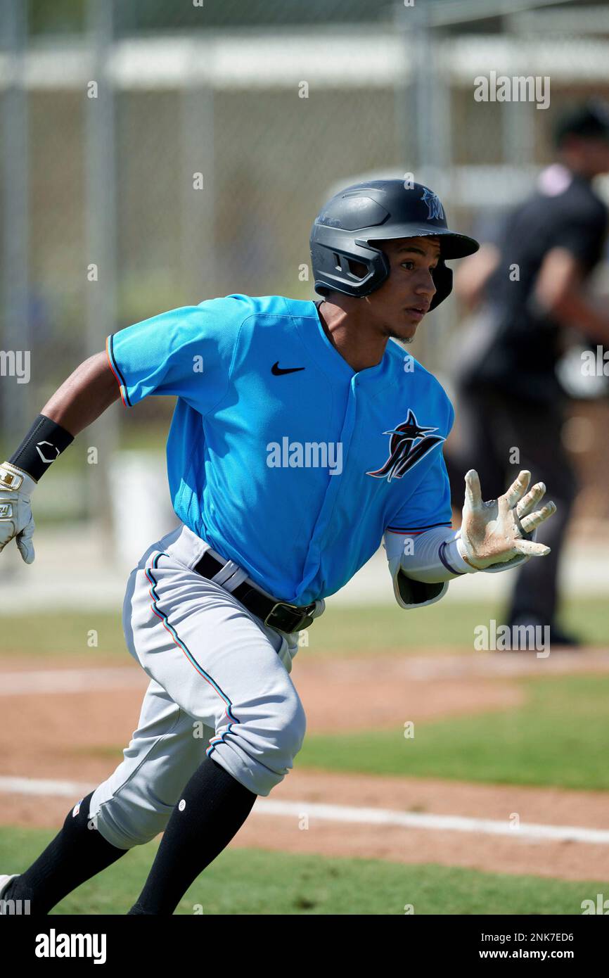 Miami Marlins shortstop Javier Sanoja (65) throws to first base during a  MiLB Spring Training game against the St. Louis Cardinals on March 30, 2022  at Roger Dean Stadium Complex in Jupiter