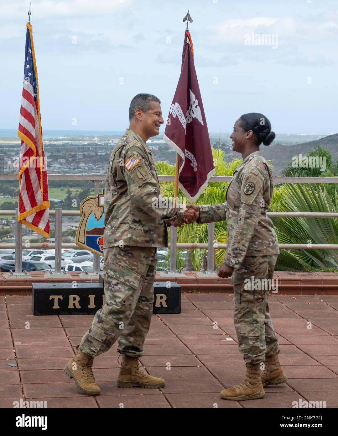 Commander coin was presented to Sgt. Kathryn Grant for her dedication during Tripler's U.S. Army Heritage Day. Stock Photo