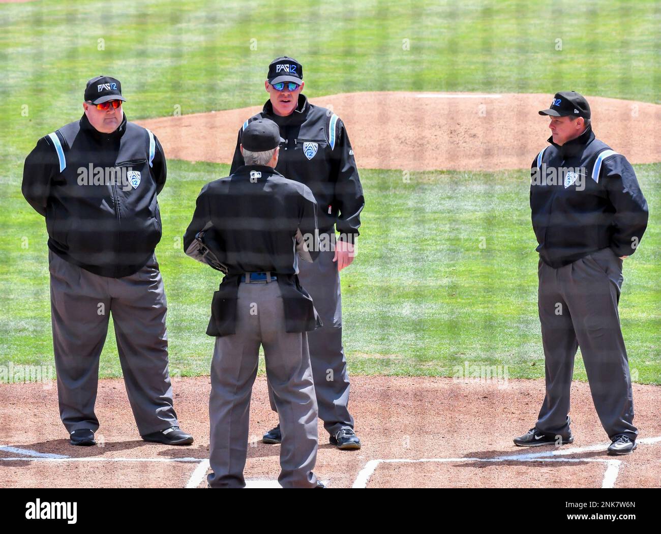STANFORD CA MAY 08: Home plate umpire A J Lostaglio briefs third