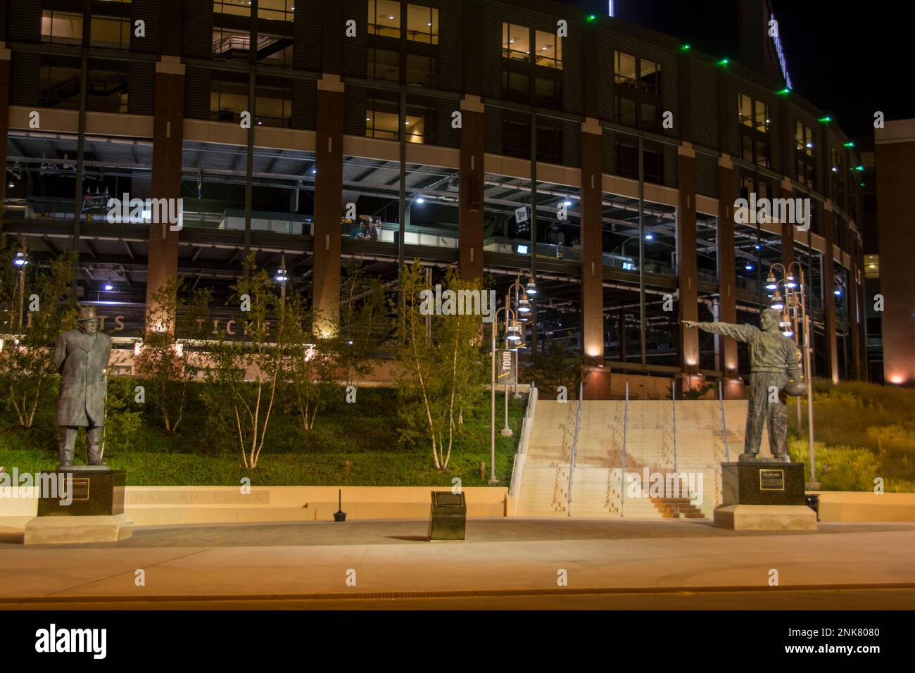 Vince Lombardi and Curley Lambeau statues stand guard in front of
