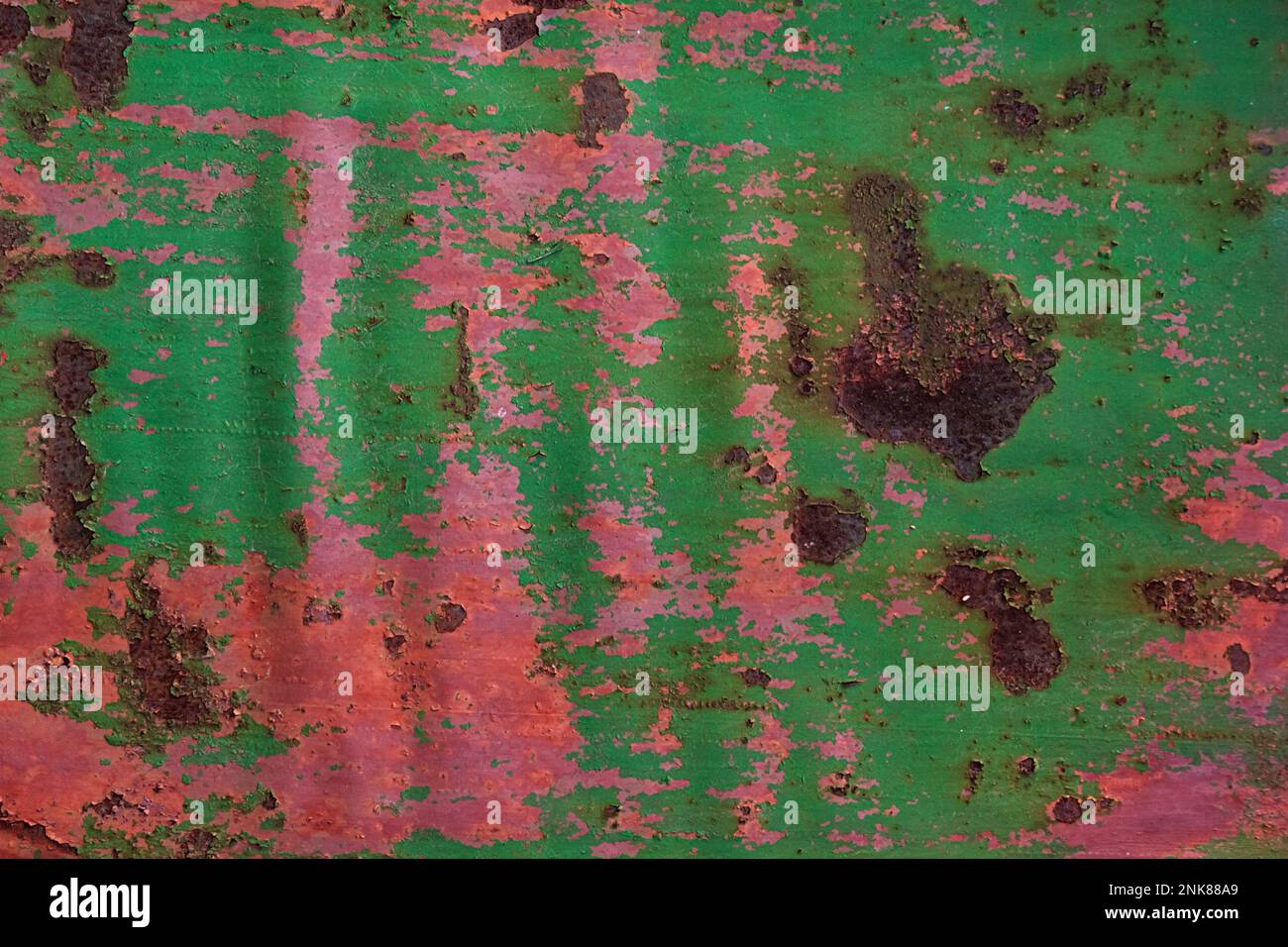 Grunge rusted metal texture, covered with old colored paint, rust and oxidized metal background. Old metal iron panel Stock Photo