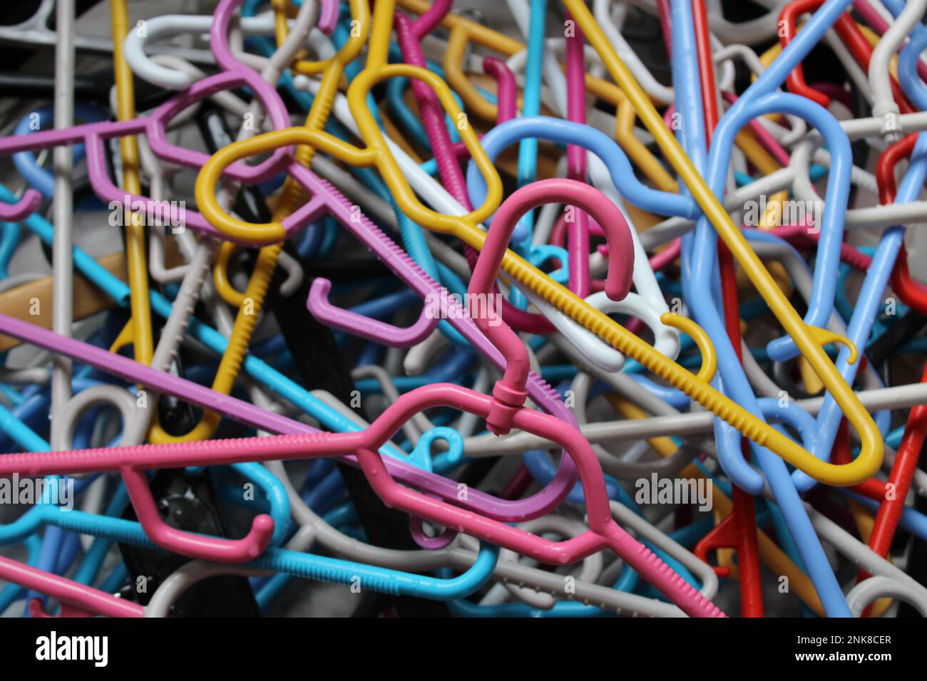 colored clothes hangers made of plastic Stock Photo Alamy