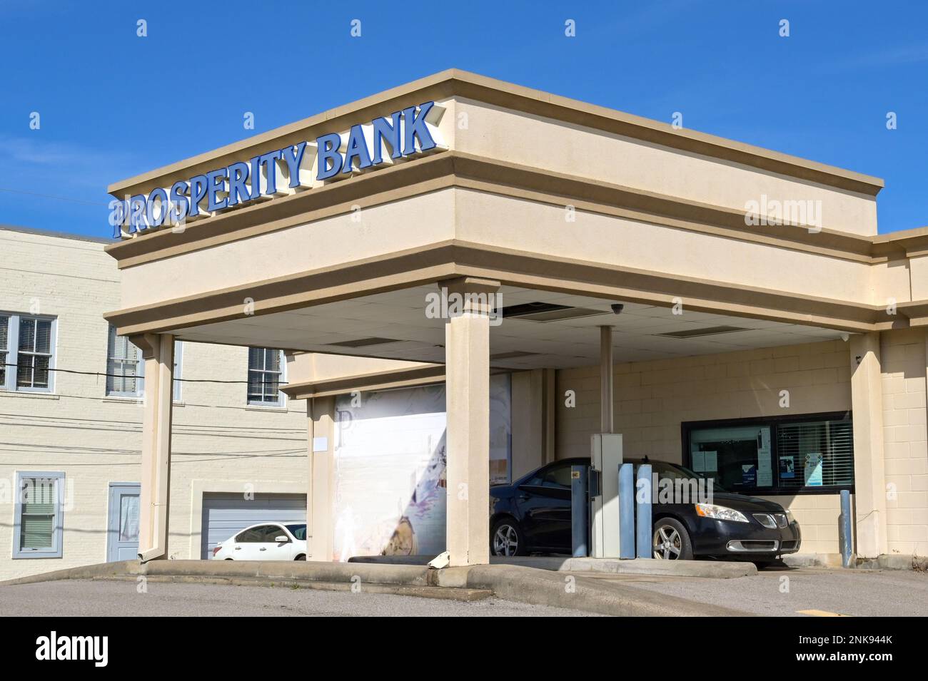 Galveston, Texas February 2023 Car stopped in a drive thru branch of