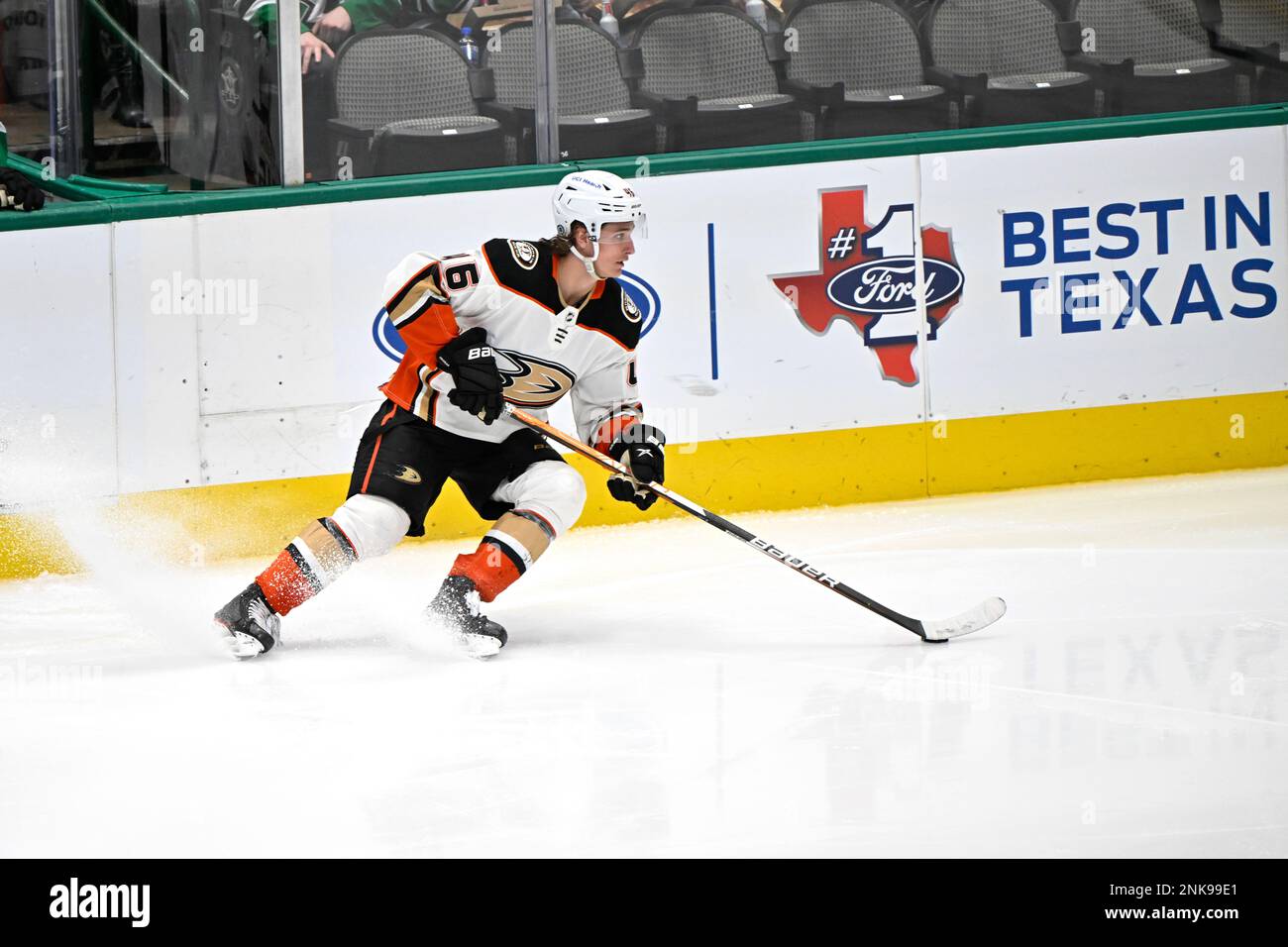 Anaheim Ducks center Trevor Zegras (11) controls the puck during the first  period of an NHL