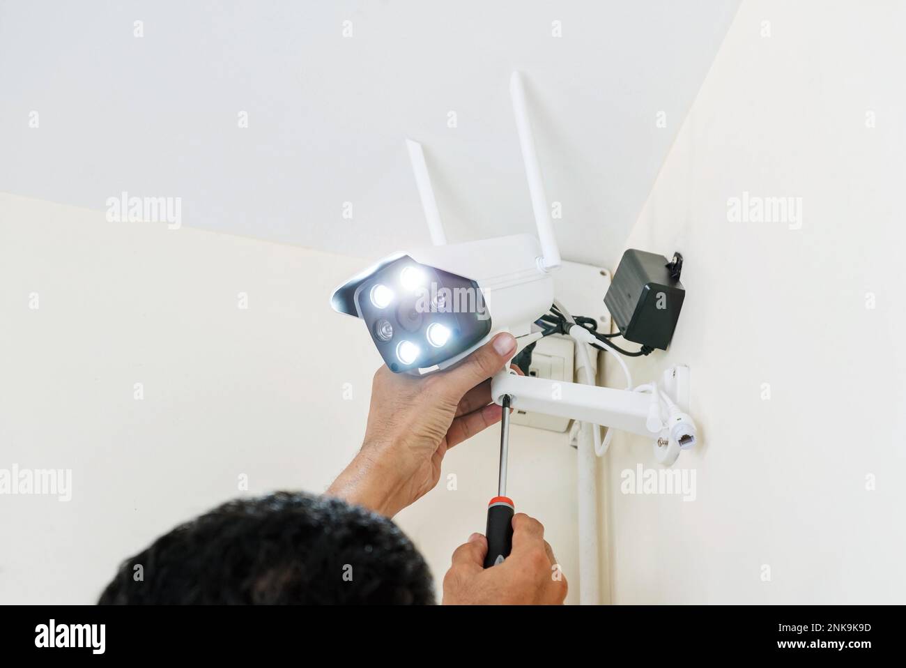 Security camera setup, cctv installation Stock Photo
