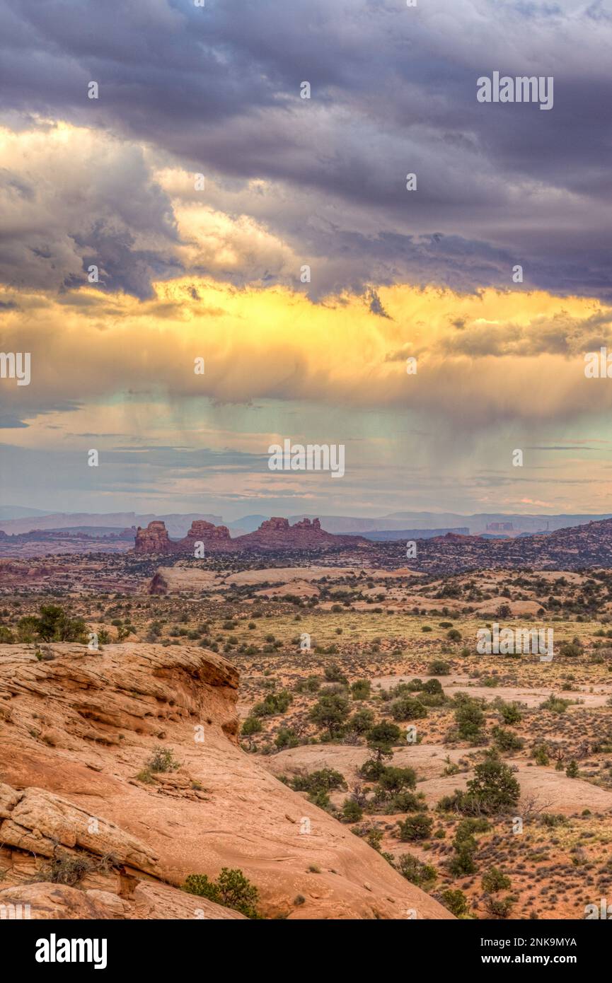 Monsoon clouds over Arth's Pasture and Arcth;s Rim near Moab, Utah, as viewed from the Navajo Rocks area. Stock Photo