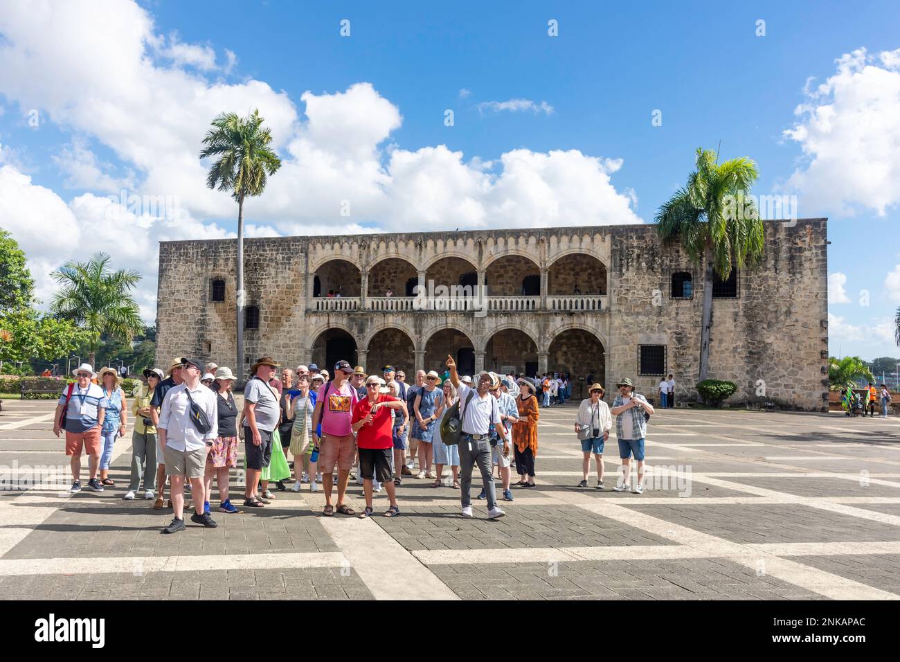 Tour group by Alcázar de Colón, Plaza de la Espana de La Hispanidad, Santo Domingo, Dominican Republic, Greater Antilles, Caribbean Stock Photo