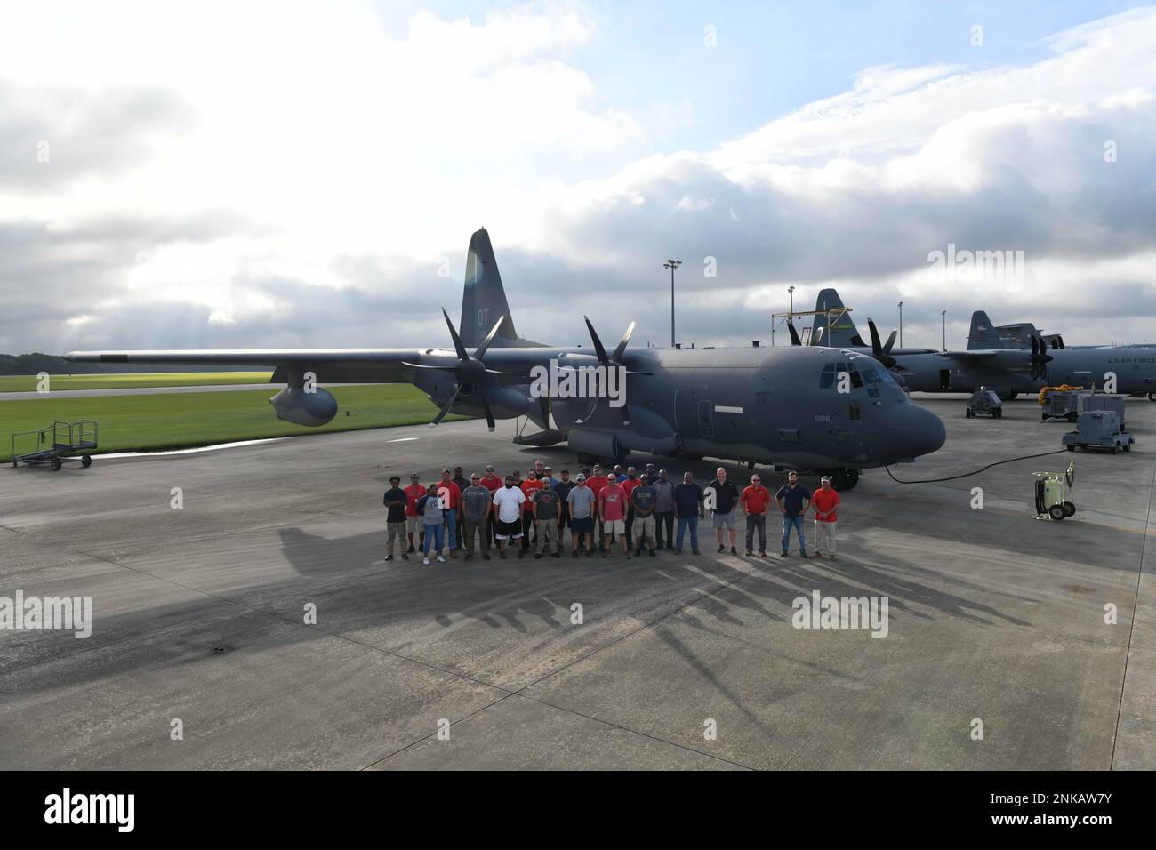 Members with the Warner Robins Air Logistics Complex 560th Aircraft Maintenance Squadron, stand beside the first HC-130J Super Hercules aircraft to receive an intensive D-Check at Robins Air Force Base, Georgia, Aug. 12, 2022. The D-Check is an extensive process equivalent to program depot maintenance, but with more inspections. It takes approximately 150 technicians 233 days to complete. Stock Photo
