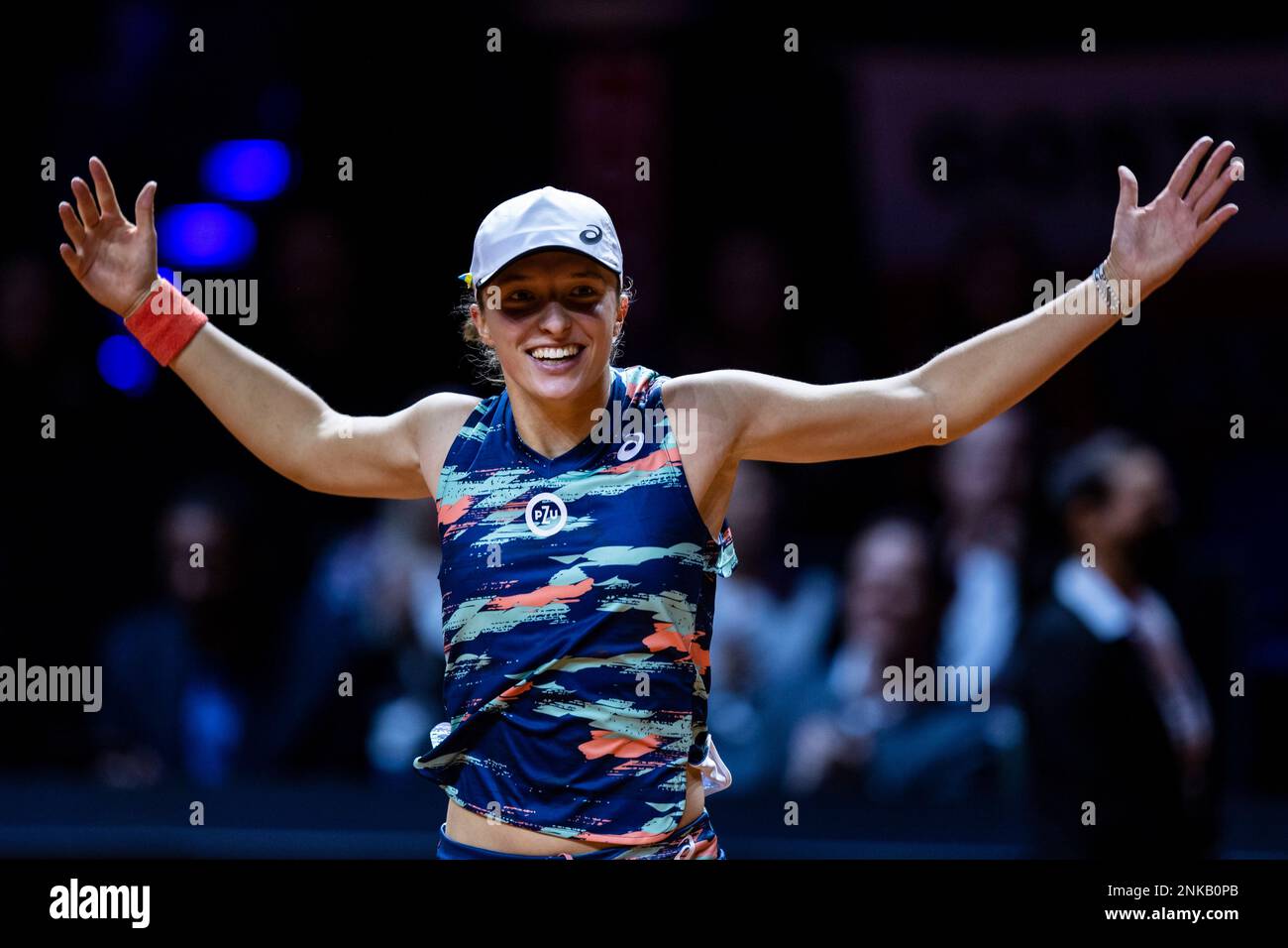 Poland's Iga Swiatek celebrates after beating Aryna Sabalenka from