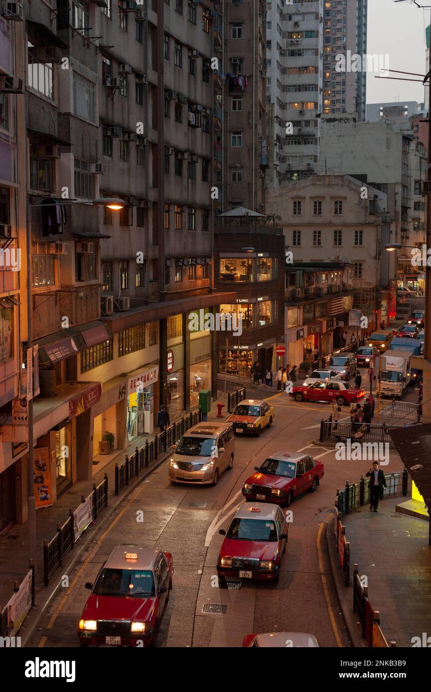 Taxis in the evening in Hong Kong's Central District. Stock Photo