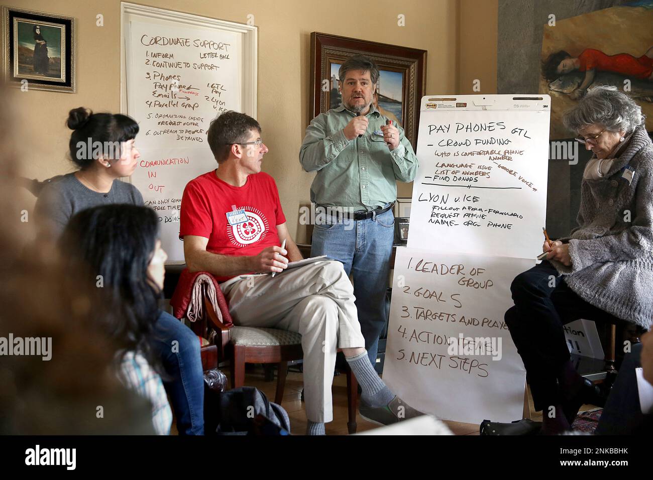 Left to right--April Newman, Karina Perez, Kent Moriarty, Rodrigo Torres  and Ann Smock coordinate how to continue support for immigrants in jail at  the home of Carmen Jimenez-Smith on Friday, March 9,