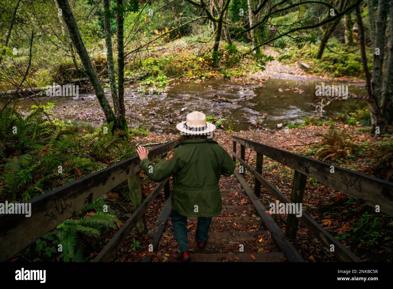 National Park Ranger Mia Monroe walks down the stairs to the Dipsea