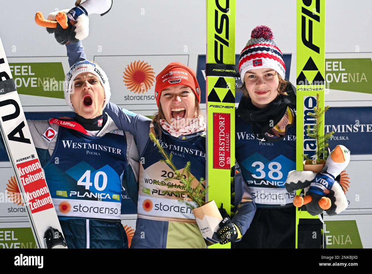 Planica, Slovenia. 23rd Feb, 2023. First placed Katharina Althaus (C) of Germany, second placed Eva Pinkelning (L) of Austria and third placed Anna Odine Stroem (R) of Norway celebrate on the podium for the Women's HS102 Ski Jumping competition at the FIS Nordic Skiing World Championships. (Photo by Andrej Tarfila/SOPA Images/Sipa USA) Credit: Sipa USA/Alamy Live News Stock Photo