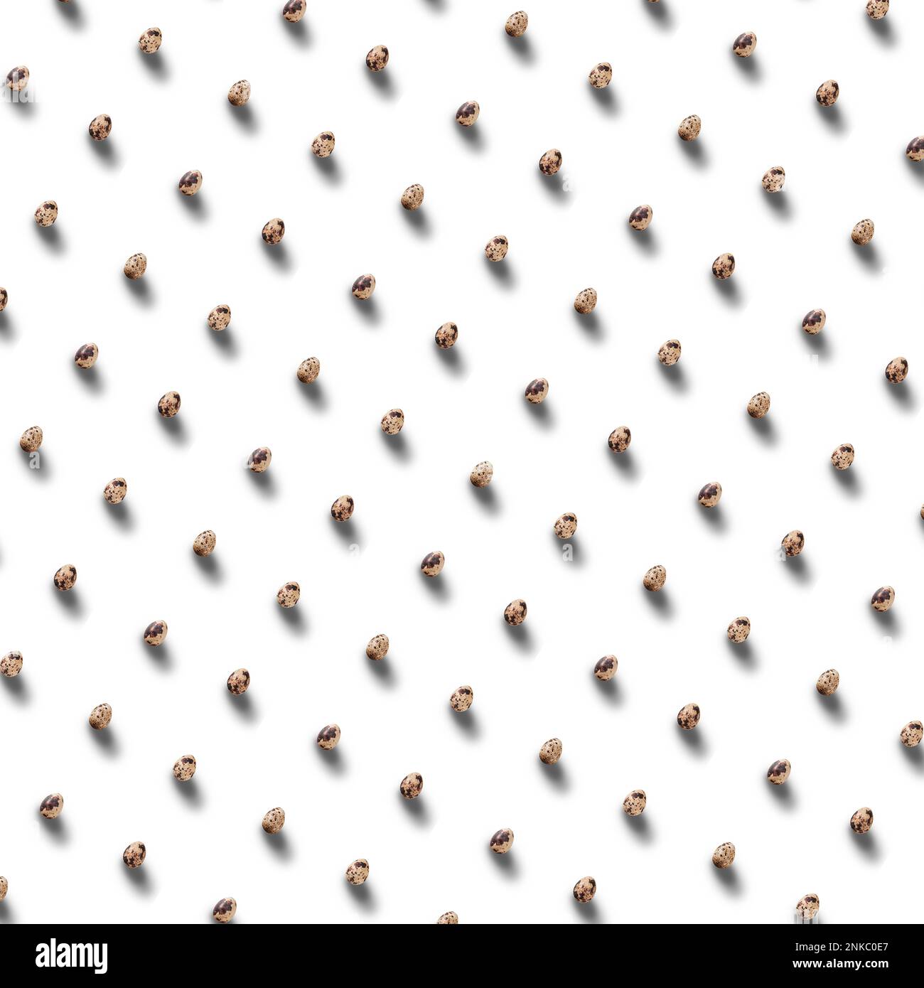 Quail eggs with shadows pattern isolated on white backgraund Stock Photo