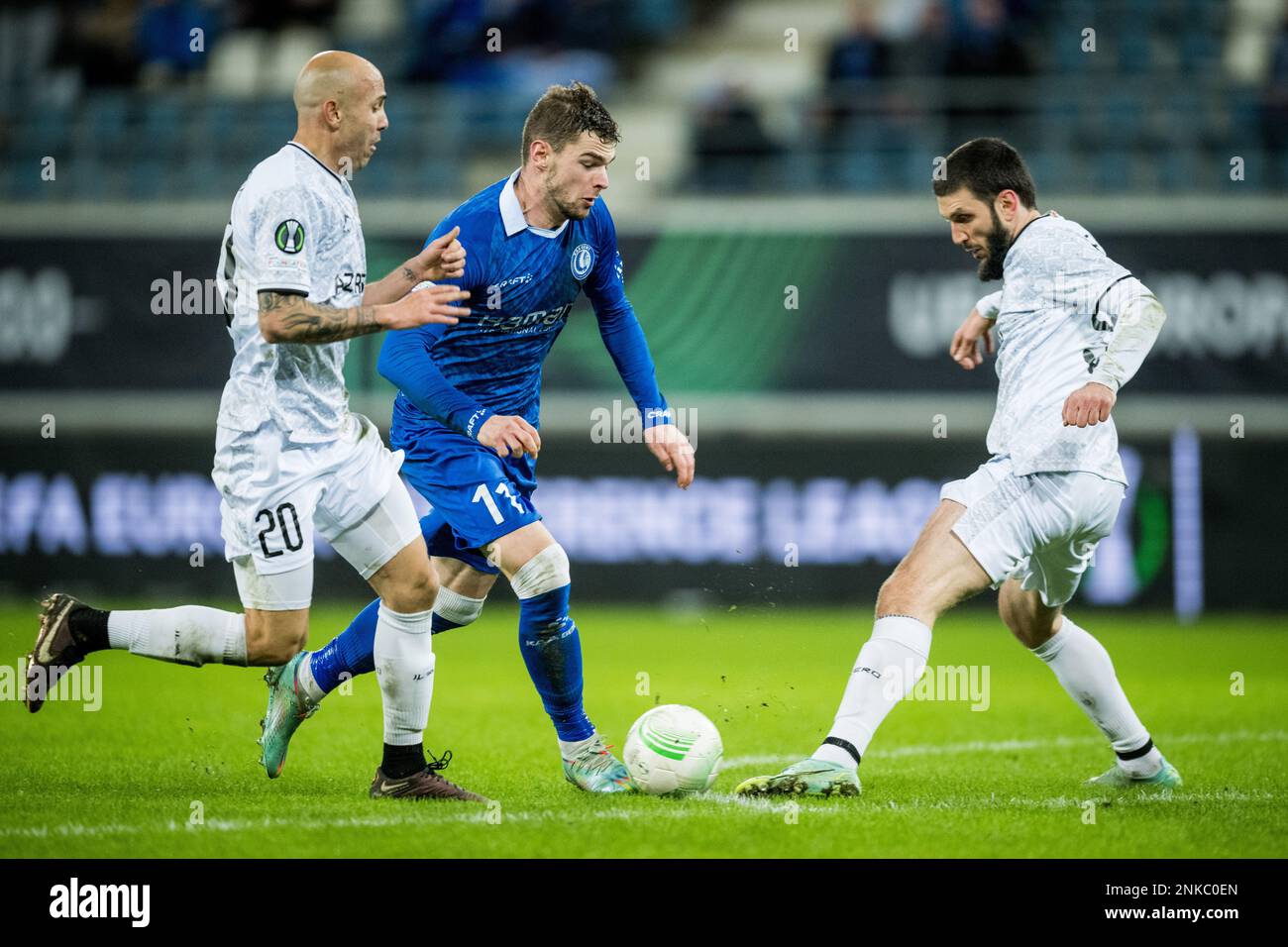 Gent, Belgium, 23/02/2023, Qarabag's Richard Almeida, Gent's Hugo Cuypers and Qarabag's Badavi Guseynov fight for the ball during a soccer game between Belgian KAA Gent and Azerbaijani Qarabag FK, Thursday 23 February 2023 in Gent, the return leg of the play-off round of the UEFA Europa Conference League competition. Qarabag won the first leg with a 1-0 score. BELGA PHOTO JASPER JACOBS Stock Photo