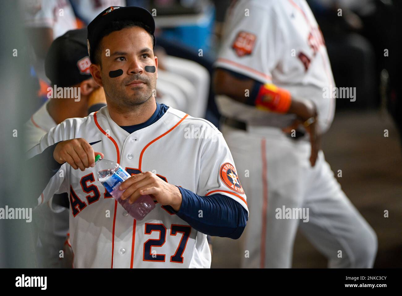 HOUSTON, TX - APRIL 18: Houston Astros second baseman Jose Altuve (27)  watches the jumbotron from the dugout before the baseball game between the  Los Angeles Angels and Houston Astros at Minute
