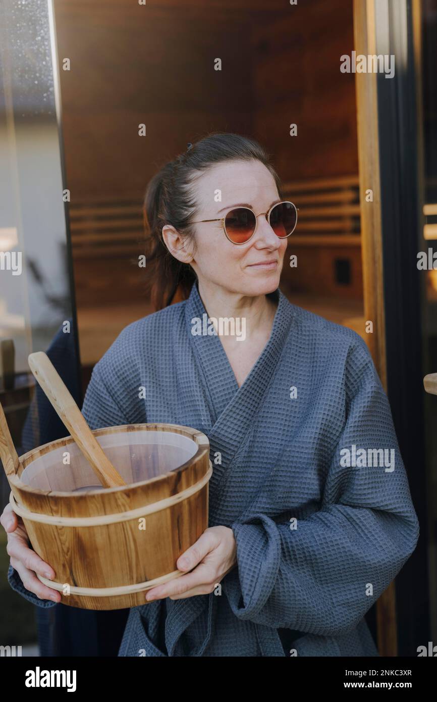Woman taking a sauna Stock Photo Alamy