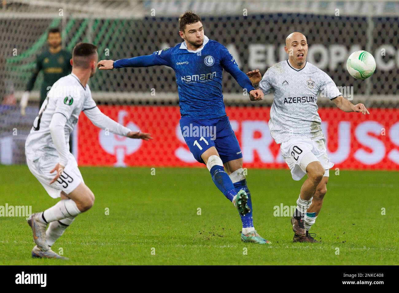 Gent, Belgium, 23/02/2023, Gent's Hugo Cuypers and Qarabag's Richard Almeida fight for the ball during a soccer game between Belgian KAA Gent and Azerbaijani Qarabag FK, Thursday 23 February 2023 in Gent, the return leg of the play-off round of the UEFA Europa Conference League competition. Qarabag won the first leg with a 1-0 score. BELGA PHOTO KURT DESPLENTER Stock Photo