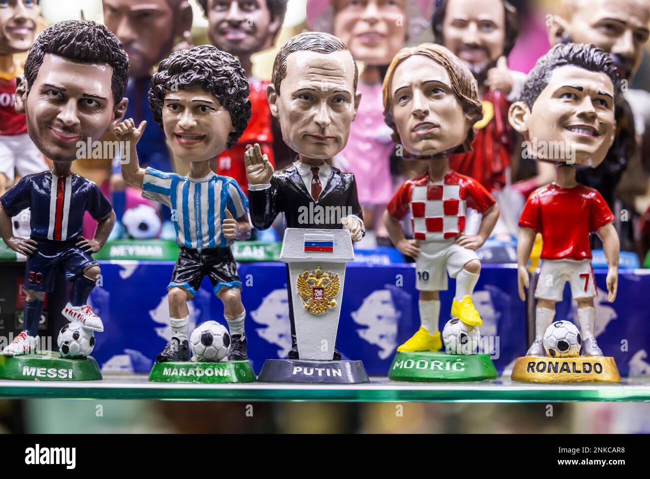 Comic figures in a shop window, from left the football player Lionel Messi, Diego Maradona, Russias President Vladimir Putin, Luka Modric, Cristiano Stock Photo
