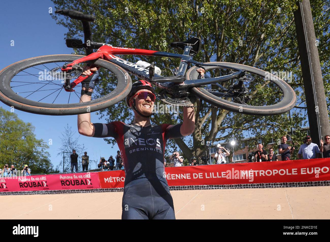 Netherlands Dylan Van Baarle celebrates after winning the Paris-Roubaix cycling race, a 257 kilometer (160 mile) one-day-race at the velodrome in Roubaix, northern France, Sunday, April 17, 2022