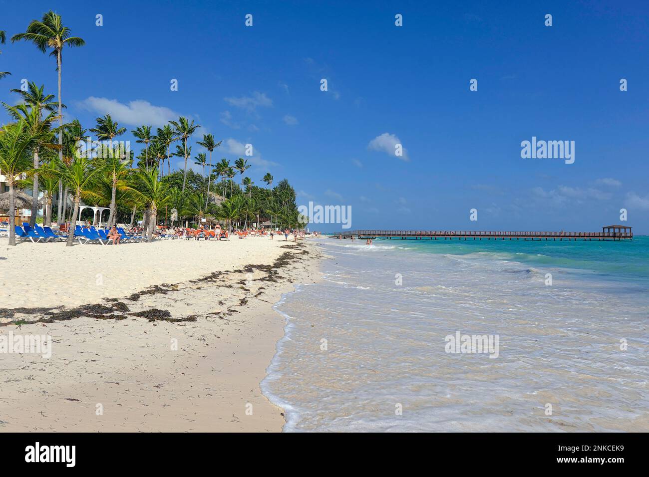 Dirty beach with jetty out to sea, Punta el Cortecito, Playa Bavaro ...