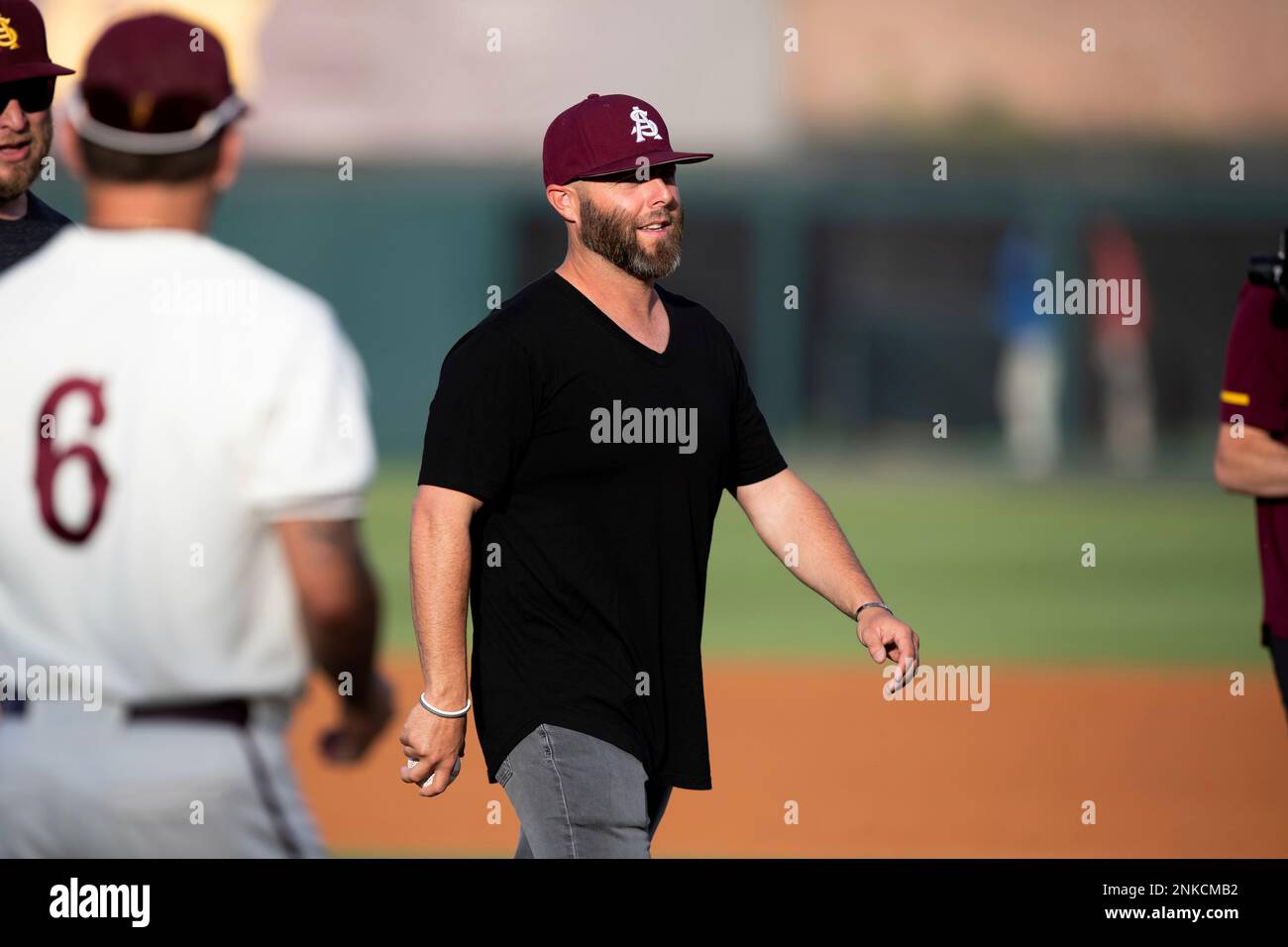 TEMPE, AZ - APRIL 15: Former ASU Sun Devil Dustin Pedroia gets honored  before a baseball game between the Arizona State Sun Devils and University  of Southern California Trojans on April 15