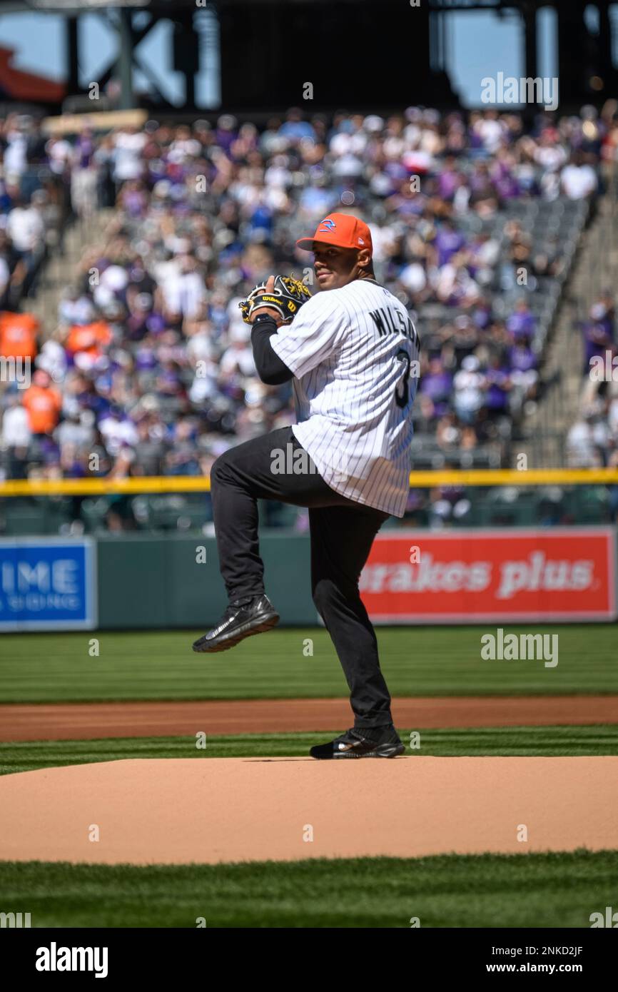 DENVER, CO - APRIL 08: Denver Broncos QB Russell Wilson throws out the  first pitch during the Colorado Rockies Opening Day game against the Los  Angelas Dodgers on April 8, 2022 at