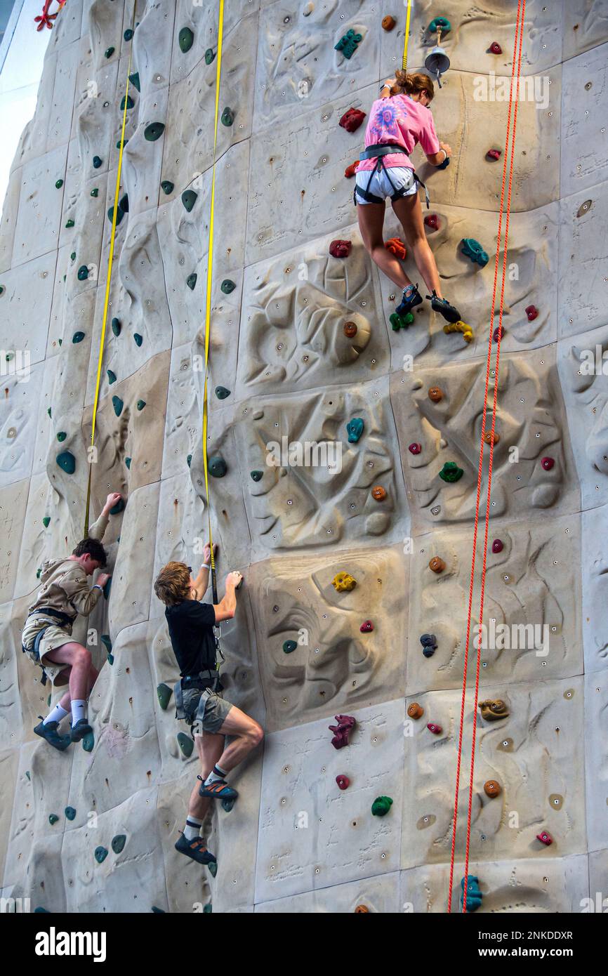 Rock climbers tackling a climb aboard the Allure of the Seas, Royal Caribbean cruise lines. Stock Photo