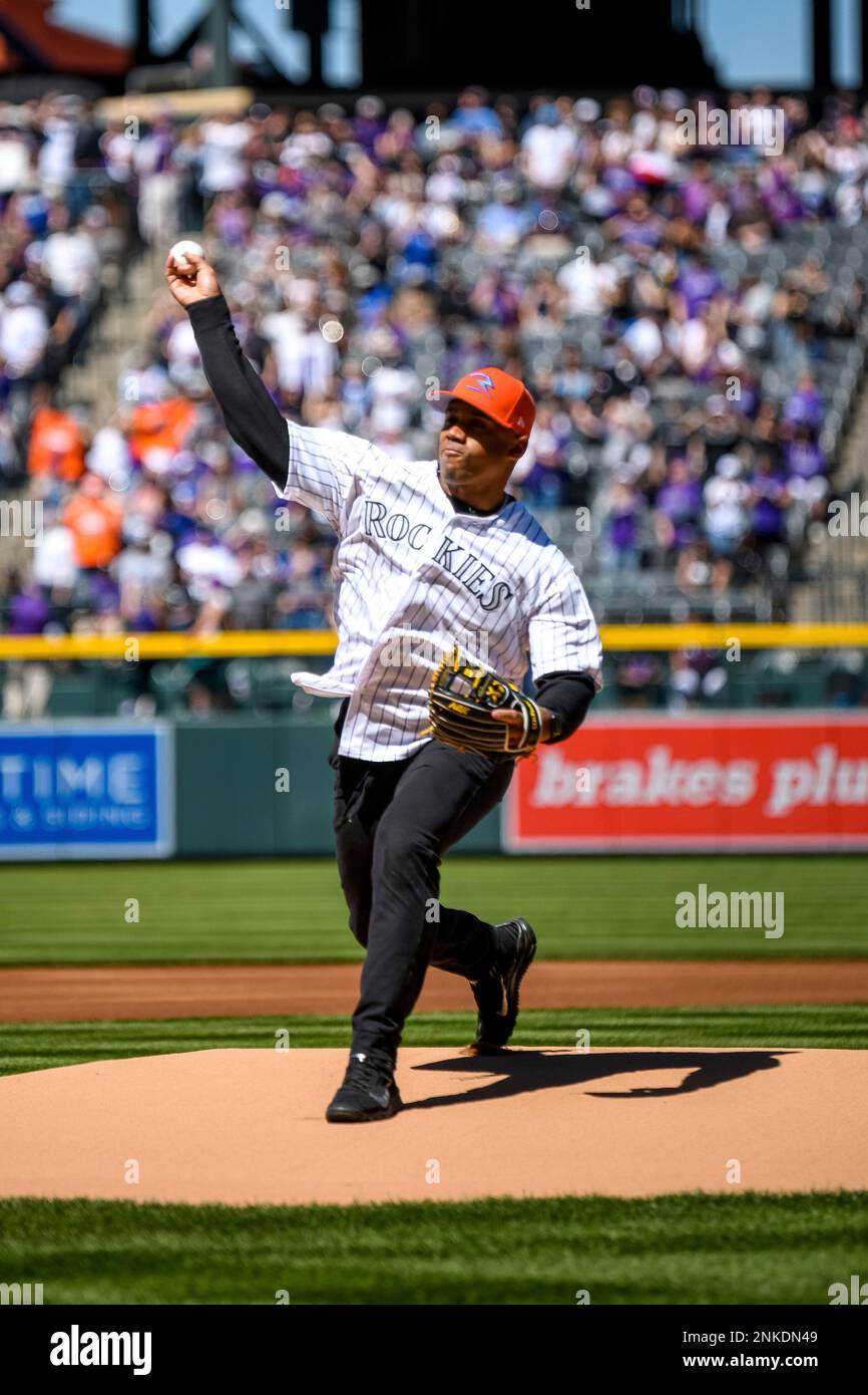 DENVER, CO - APRIL 08: Denver Broncos QB Russell Wilson throws out the fist  pitch during the Colorado Rockies Opening Day game against the Los Angelas  Dodgers on April 8, 2022 at