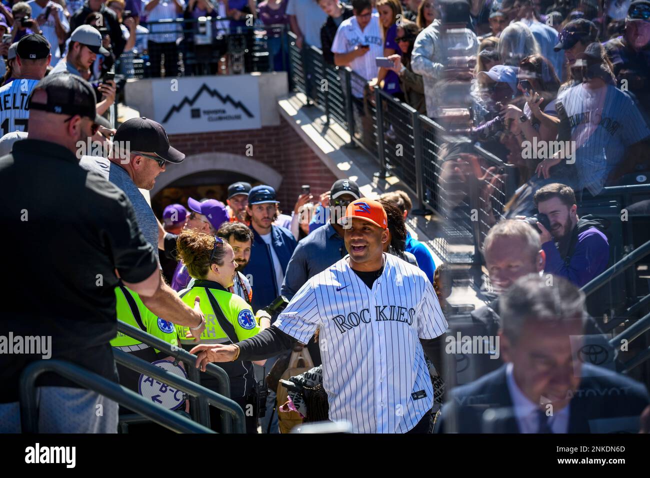 DENVER, CO - APRIL 08: Denver Broncos QB Russell Wilson throws out the  first pitch during the Colorado Rockies Opening Day game against the Los  Angelas Dodgers on April 8, 2022 at