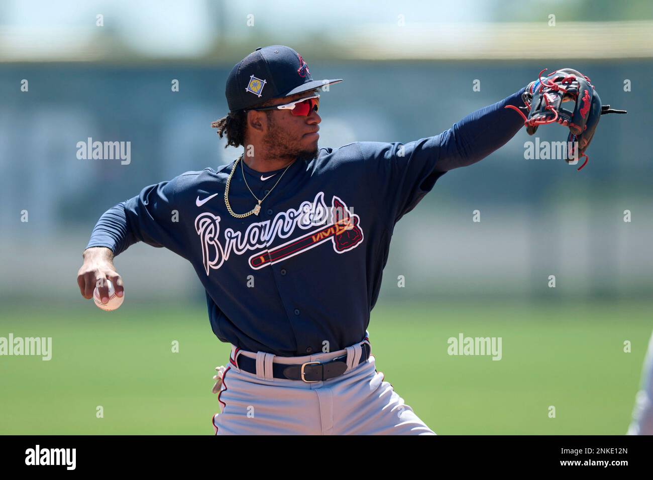 Atlanta Braves shortstop Ambioris Tavarez (32) throws to first base during a MiLB Spring Training game against the Boston Red Sox on March 21, 2022 at CoolToday Park Complex in North Port,