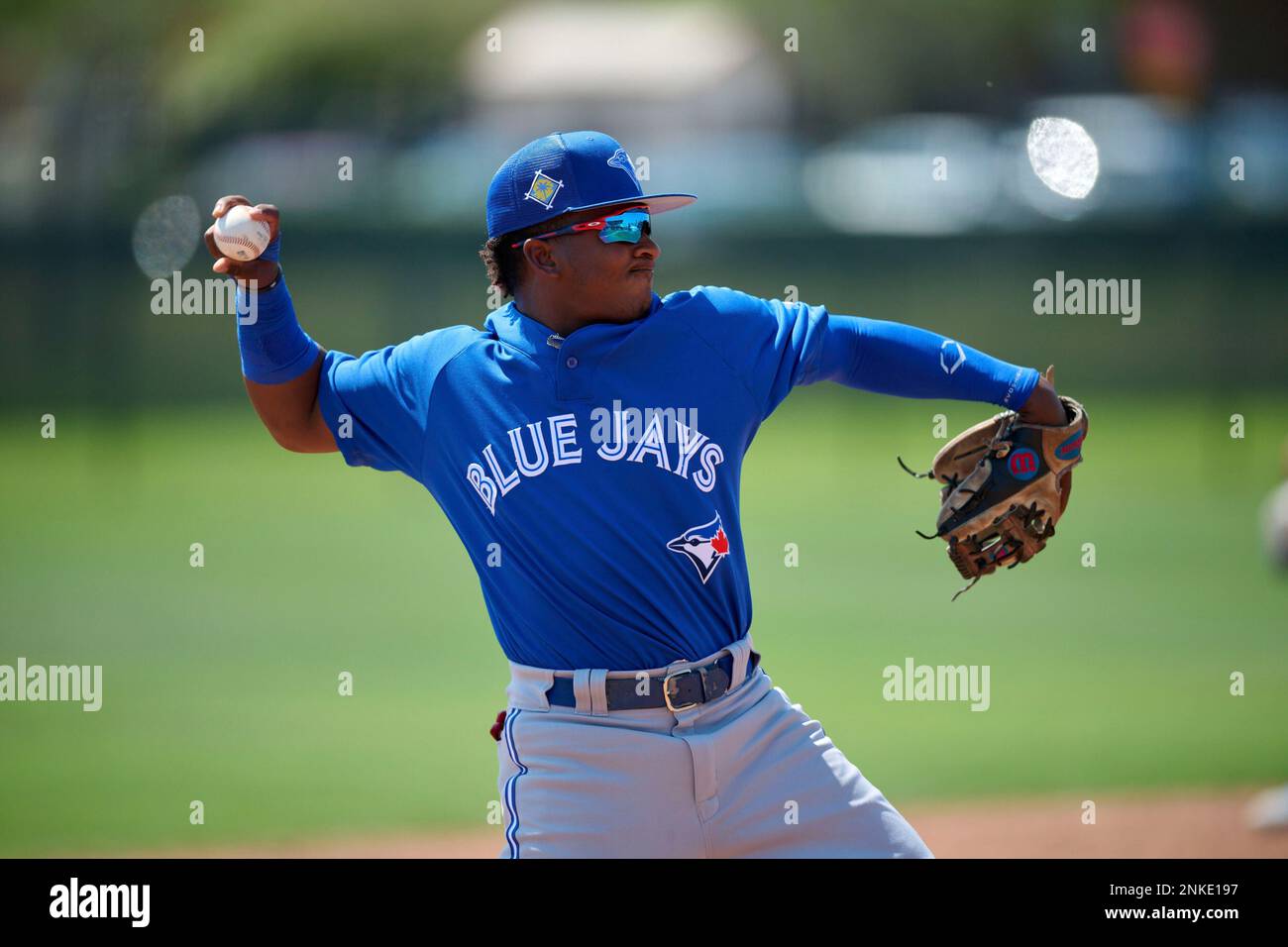 Toronto Blue Jays third baseman Francisco Fajardo (52) throws to first base during a MiLB Spring Training game against the Philadelphia Phillies on March 20, 2022 at the Carpenter Complex in Clearwater,