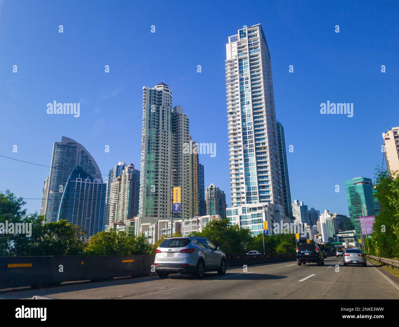 avenue road to the city in the background skyscraper Stock Photo