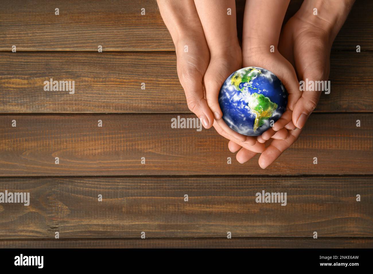Hands holding planet text space hi-res stock photography and images - Alamy