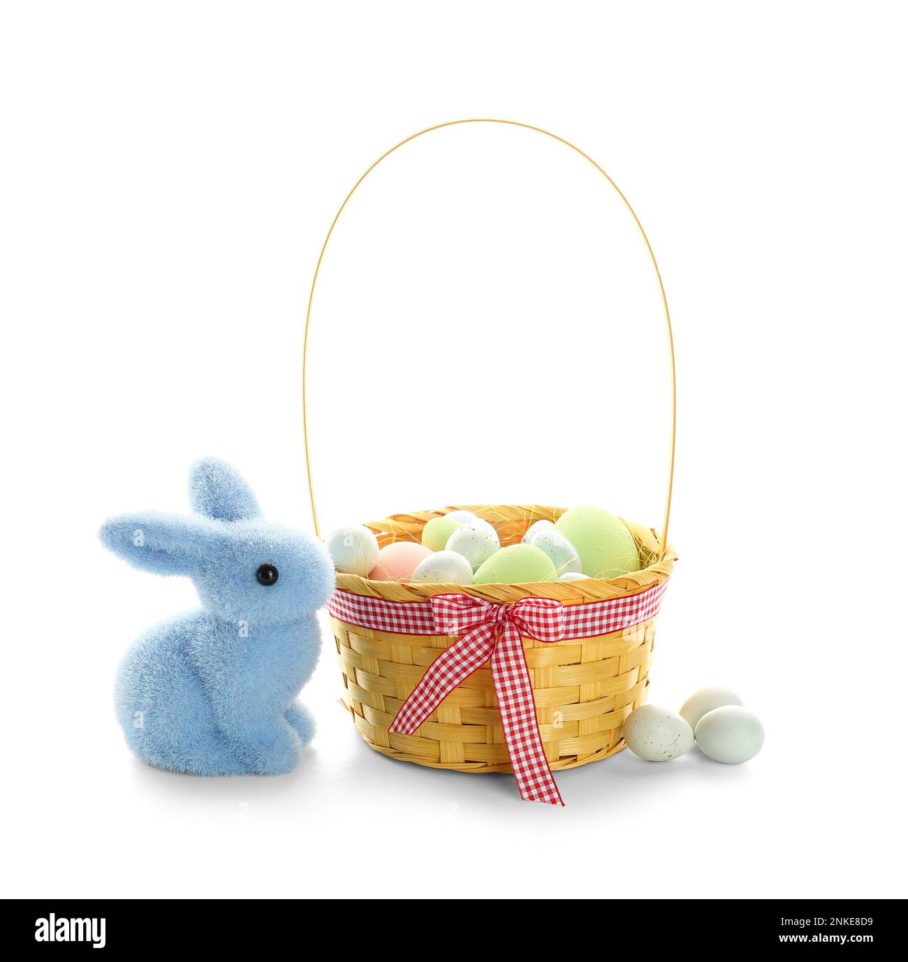 Basket with Easter eggs and toy bunny on white background Stock Photo ...