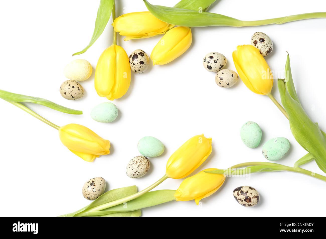 Composition with Easter eggs and tulip flowers isolated on white ...