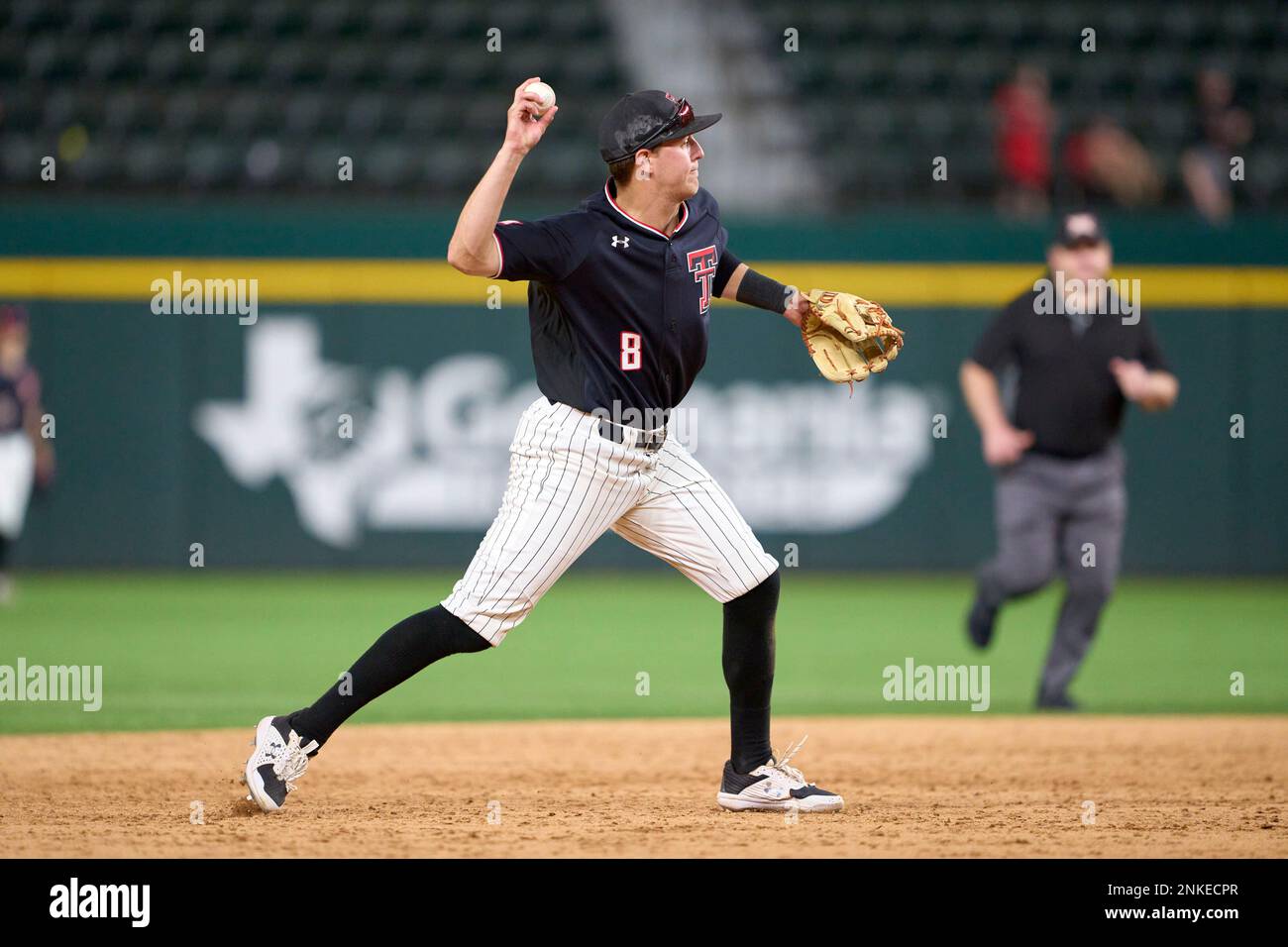 Texas Tech Red Raiders shortstop Kurt Wilson (8) throws to first base