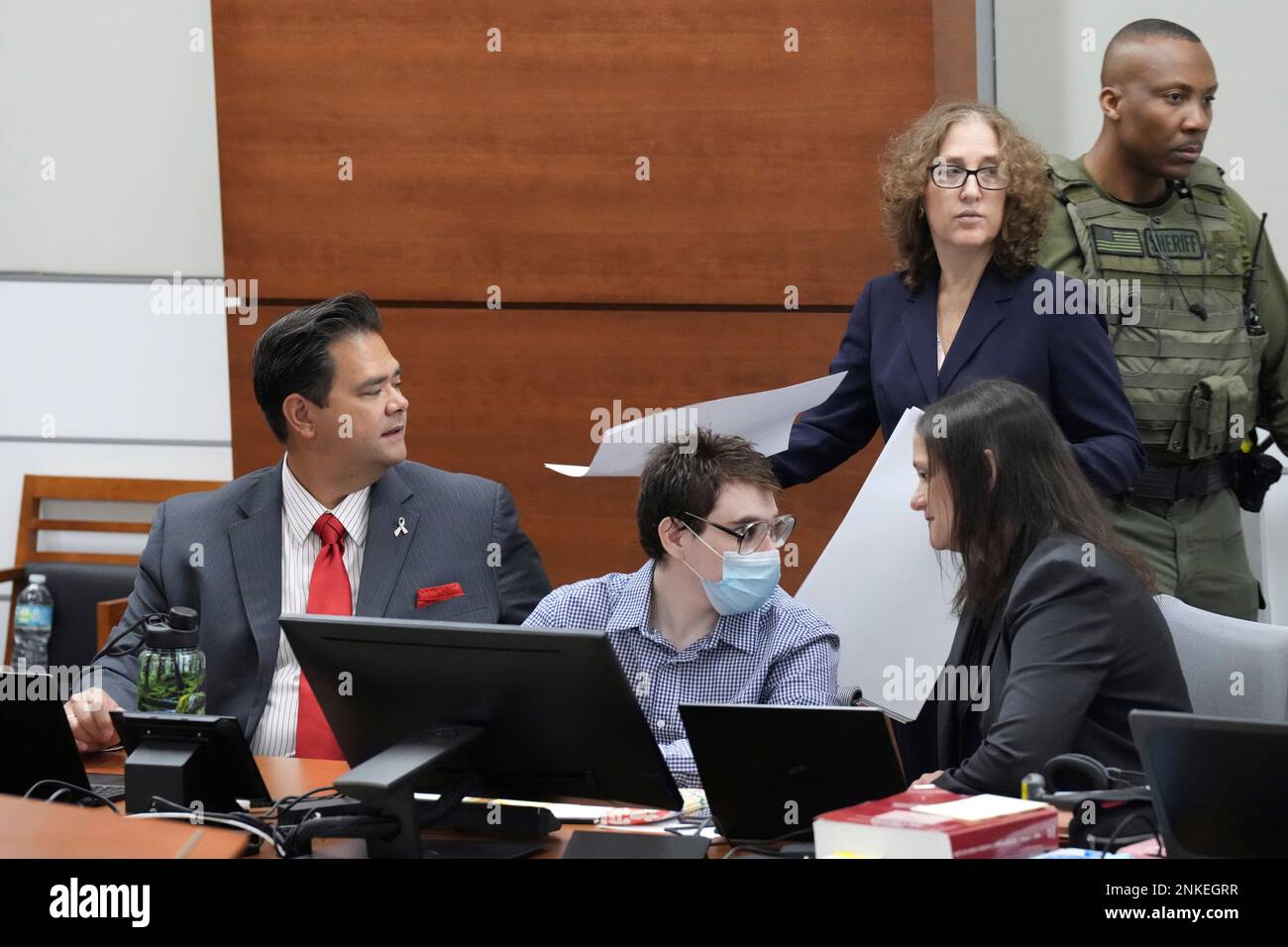 Nikolas Cruz center, speaks to sentence mitigation specialist Kate O