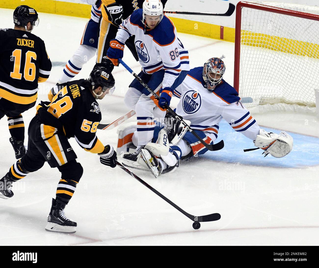 Pittsburgh Penguins defenseman Kris Letang (58) shoots and scores on ...
