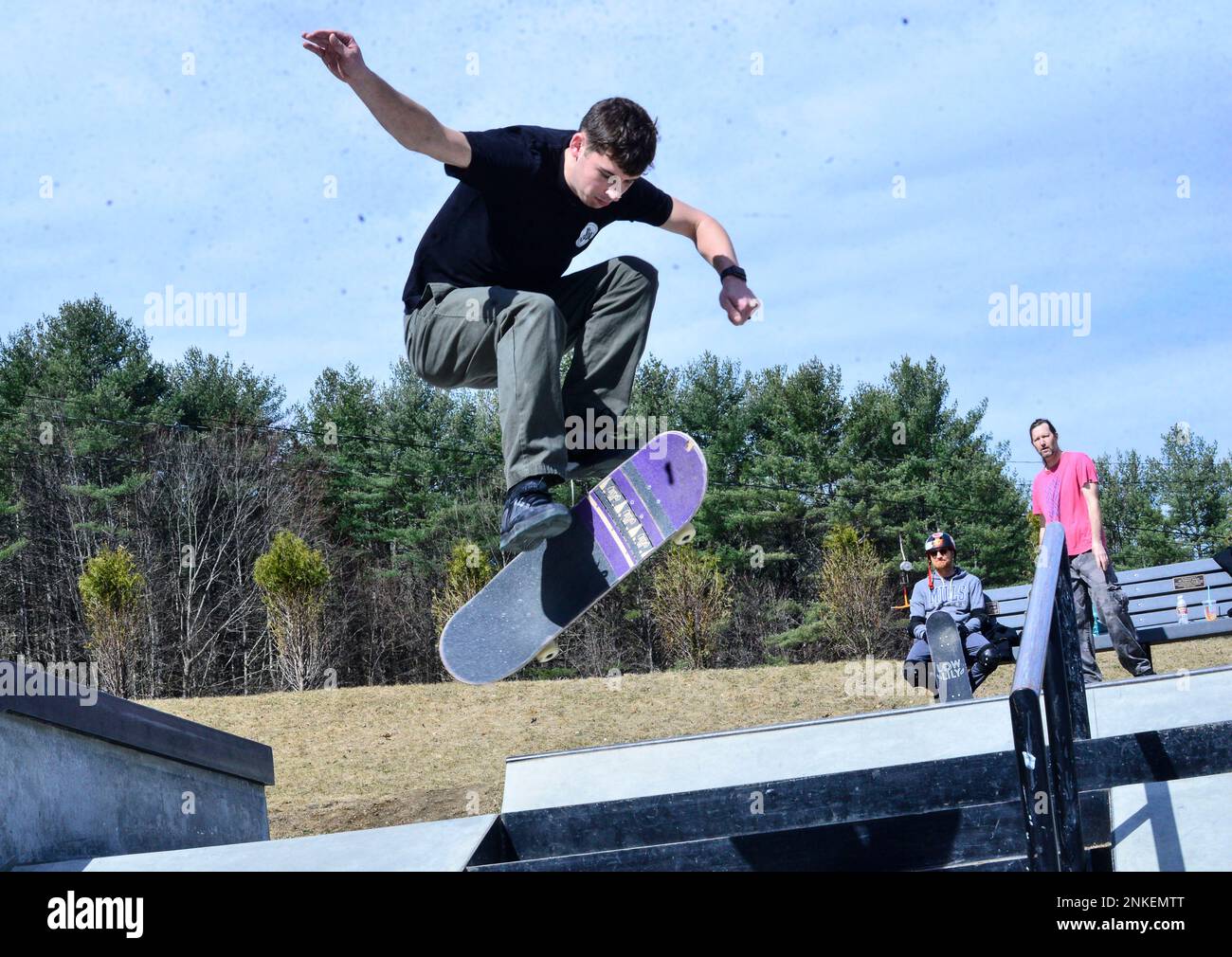 Tyler Clews, from Keene, N.H., does a trick on his board at Living