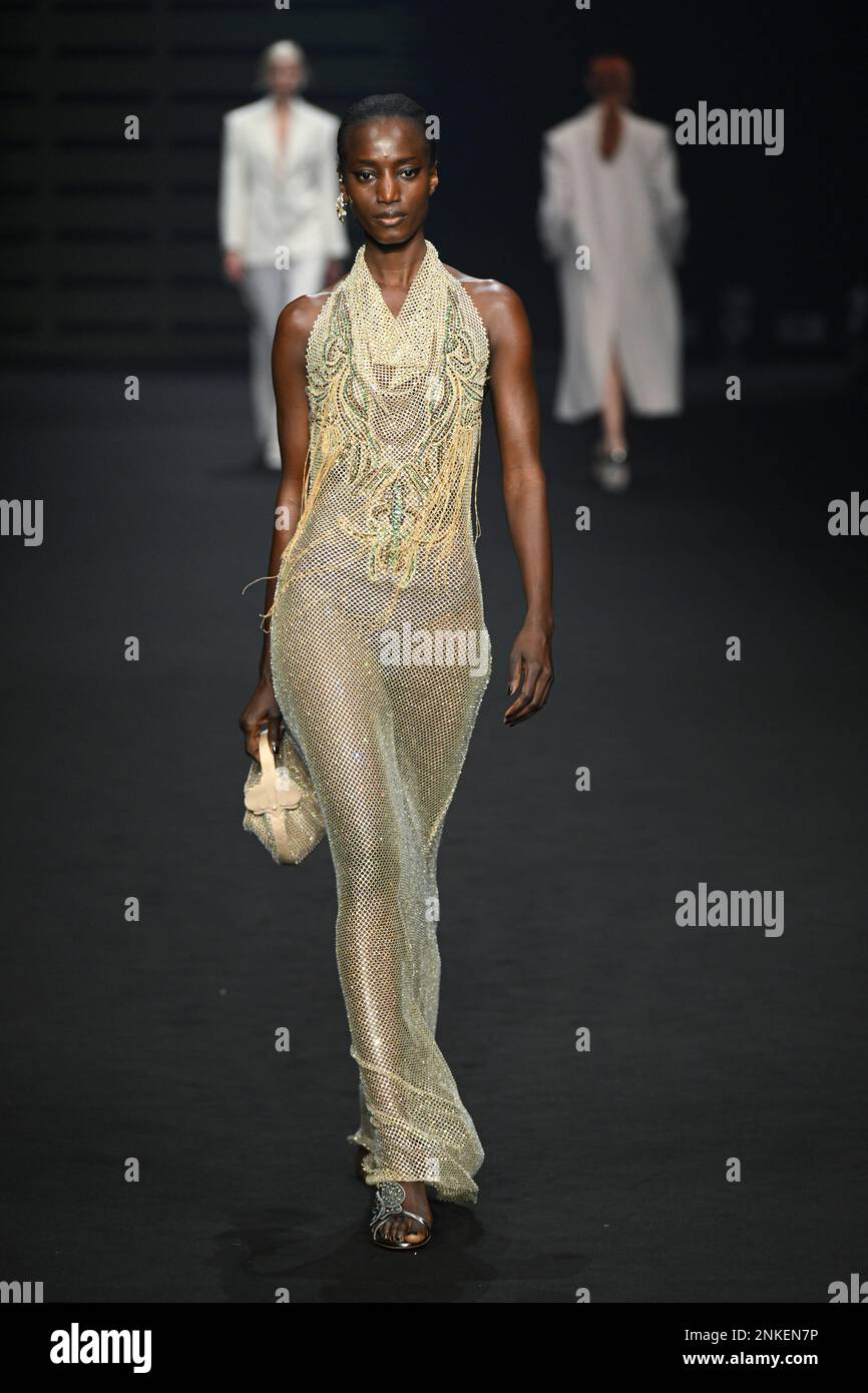 Milan, Moncalieri, Italy. 23rd Feb, 2023. A model on the runway for the Genny fashion show at the Milan Fashion Week Woman's fall winter 2023/24. (Credit Image: © Riccardo Giordano/ZUMA Press Wire) EDITORIAL USAGE ONLY! Not for Commercial USAGE! Stock Photo